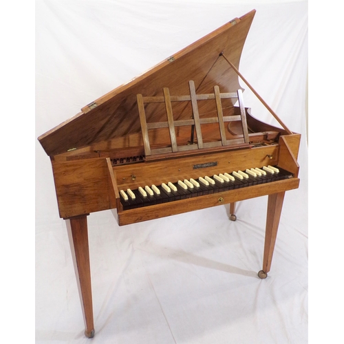 180 - Mahogany cased Spinet by Neupert Bamberg, NFI37, on square tapering legs with castors