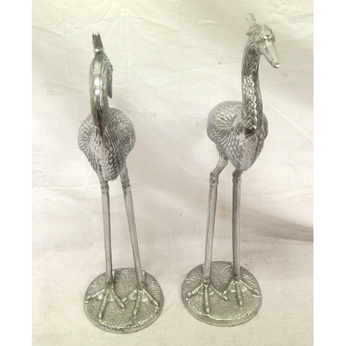 184 - Pair of metal stork figures with round bases