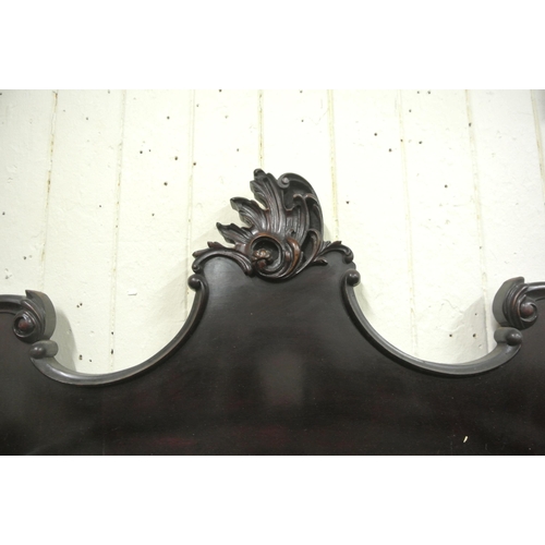 185 - Victorian mahogany display cabinet with ornate scroll decorated back, shaped bevelled mirror insets,... 