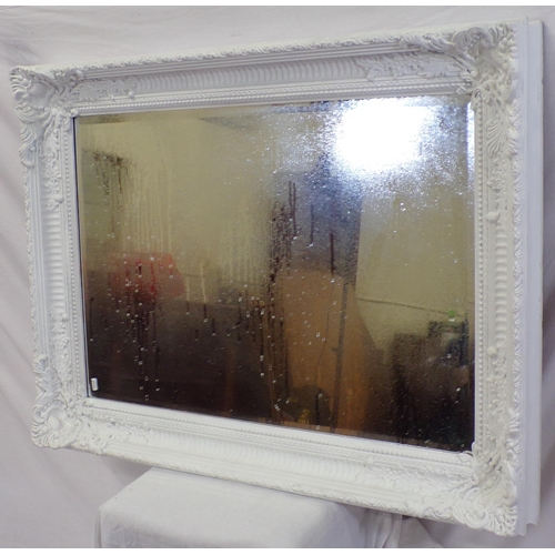 198 - Victorian style bevelled glass wall mirror with foliate decorated frame