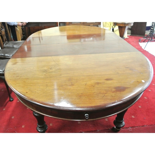 200 - Victorian mahogany D-end dining table with two extra leaves inset, rounded borders, on turned taperi... 