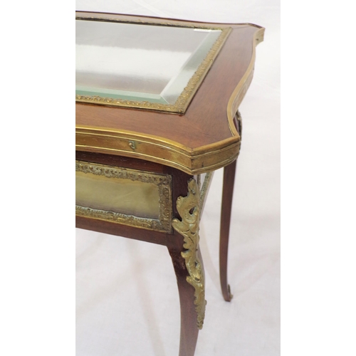 201 - Edwardian mahogany bijouterie table with bevelled glass insets, ormolu mounts and borders, on cabrio... 