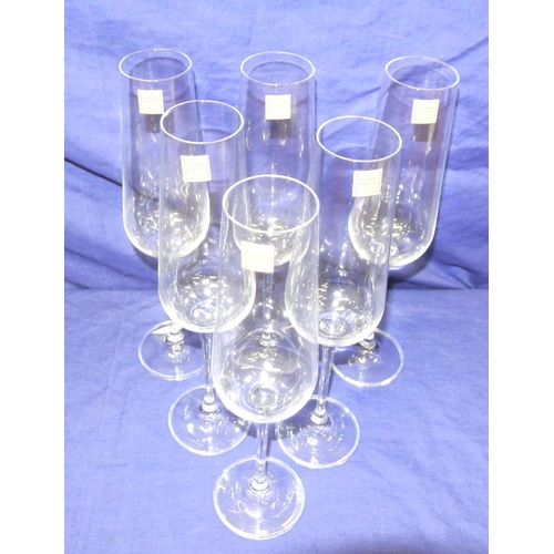 213 - Set of six Tipperary Crystal stemmed champagne or white wine flutes with round bases