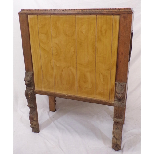 30 - Victorian oak cabinet with ornate bird decorated carved doors, frieze drawer, on carved legs