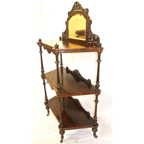 35 - Victorian rosewood three tier dumbwaiter with angled sides, pierced fretwork decoration, bevelled mi... 