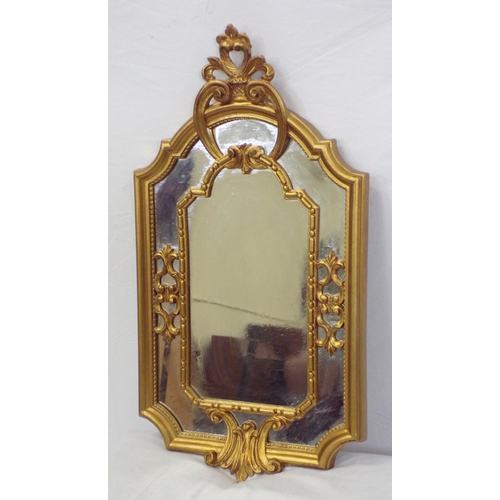 38 - Ornate Regency design small gilt framed dome top wall mirror with scroll decoration