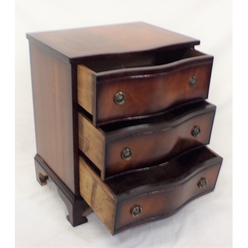 51 - Edwardian style serpentine fronted inlaid mahogany chest of three drawers with drop handles and brac... 