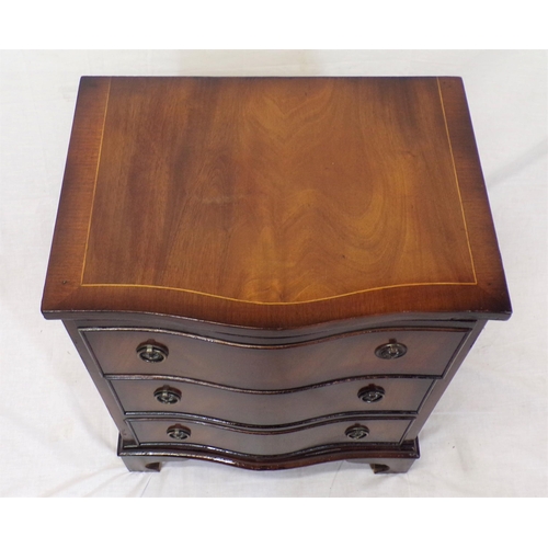 51 - Edwardian style serpentine fronted inlaid mahogany chest of three drawers with drop handles and brac... 