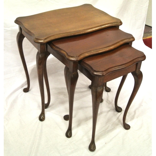 6 - Edwardian nest of three mahogany tables with wavyborders and cabriole legs