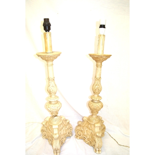 62 - Pair of electric table lamps with scroll and foliate decoration