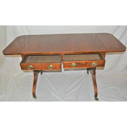 65 - Edwardian inlaid and crossbanded mahogany and walnut sofa table with lyre shaped dropped leaves, sat... 