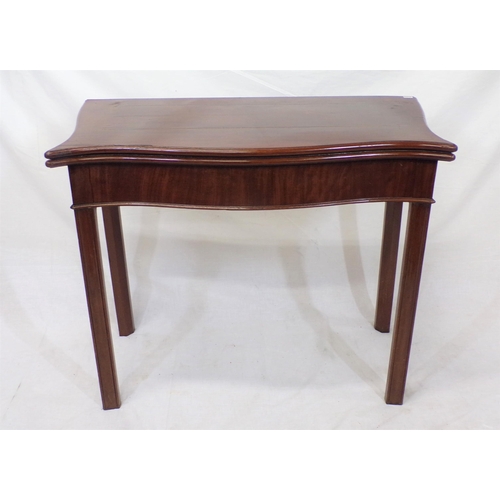 85 - Georgian mahogany card table with serpentine borders, fold-over top, gateleg support, on chamfered l... 