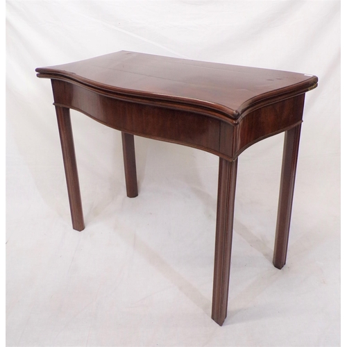 85 - Georgian mahogany card table with serpentine borders, fold-over top, gateleg support, on chamfered l... 