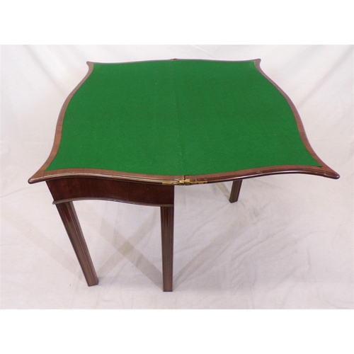 85 - Georgian mahogany card table with serpentine borders, fold-over top, gateleg support, on chamfered l... 