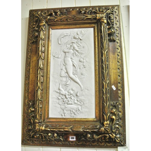 89 - Victorian style plaque with figures and angels, flowers in vases, in ornate gilt frame 50x24cm