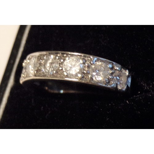 235 - Ladies half eternity seven diamond stone gold ring mounted on gold shank