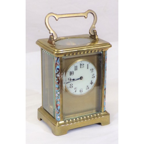 240 - Brass and enamel carriage clock with shaped handle