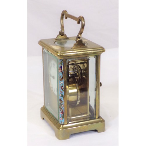 240 - Brass and enamel carriage clock with shaped handle