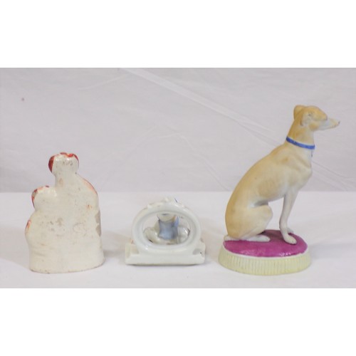 234 - Porcelain, Staffordshire  and Bisque figures of Dogs (3)