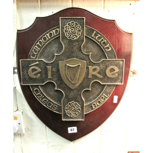 217 - Bronzed GAA 'Eire' plaque with shield shaped timber backplate