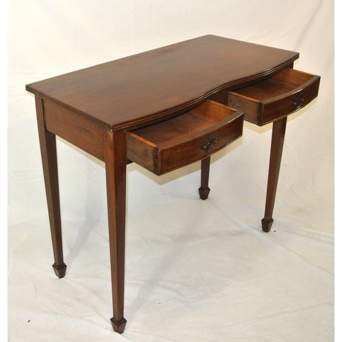 109 - Edwardian mahogany serpentine fronted hall or side table with bow frieze drawers, brass drop handles... 