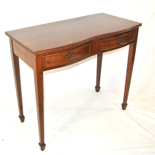 109 - Edwardian mahogany serpentine fronted hall or side table with bow frieze drawers, brass drop handles... 