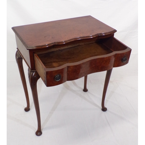 111 - Edwardian walnut hall or side table with serpentine shaped front, frieze drawer with drop handles, o... 