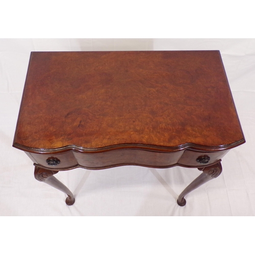 111 - Edwardian walnut hall or side table with serpentine shaped front, frieze drawer with drop handles, o... 