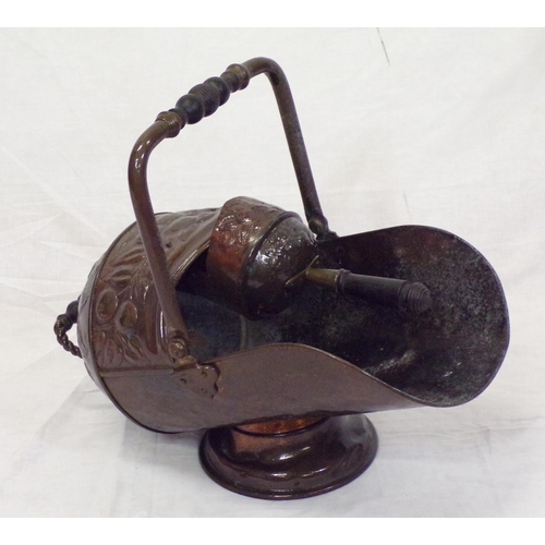 112 - Victorian copper helmet shaped coal scuttle with shaped handles and scoop