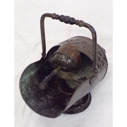 112 - Victorian copper helmet shaped coal scuttle with shaped handles and scoop