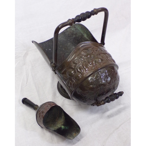 112 - Victorian copper helmet shaped coal scuttle with shaped handles and scoop