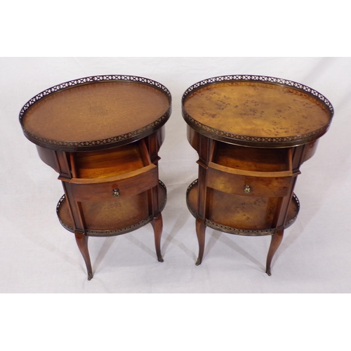 116 - Pair of Edwardian style oval two tier occasional tables with pierced gallery, bowed frieze drawer, s... 