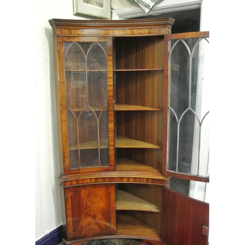 120 - Edwardian mahogany concave fronted corner display cabinet with dentil frieze, bowed doors with astra... 