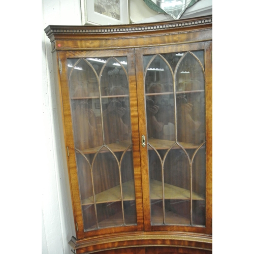 120 - Edwardian mahogany concave fronted corner display cabinet with dentil frieze, bowed doors with astra... 