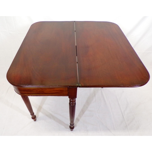 135 - Edwardian mahogany card table with fold-over top, reeded borders, gateleg support, on reeded taperin... 