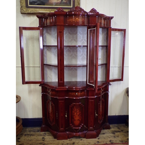 140 - French style serpentine fronted display cabinet with scroll decorated pediments, foliate inlay, shap... 