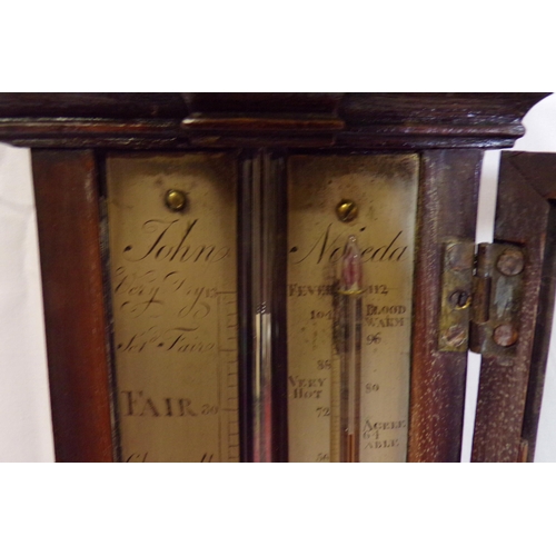 142 - Victorian mahogany stick barometer with shaped pediment and round base by John Noida