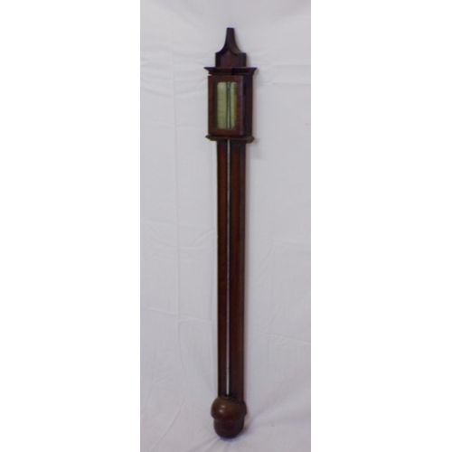 142 - Victorian mahogany stick barometer with shaped pediment and round base by John Noida