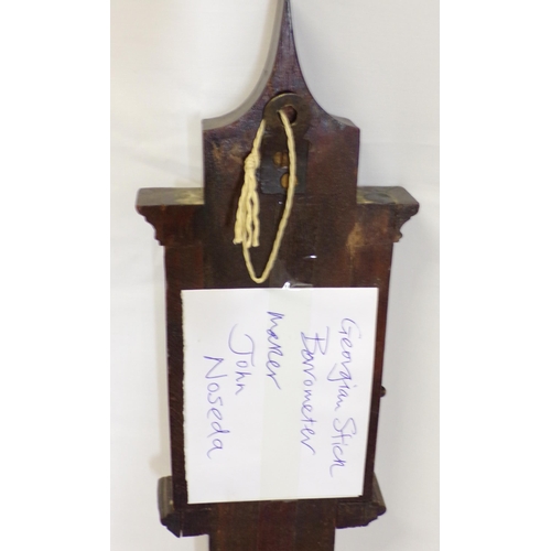 142 - Victorian mahogany stick barometer with shaped pediment and round base by John Noida