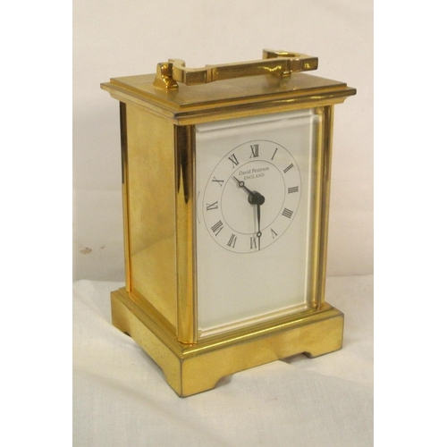 143 - Edwardian style brass framed carriage clock with bevelled glass panels by David Petersen, England