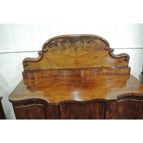 150 - Victorian mahogany chiffonier with shaped scroll decorated back, centre drawer and press, two side p... 