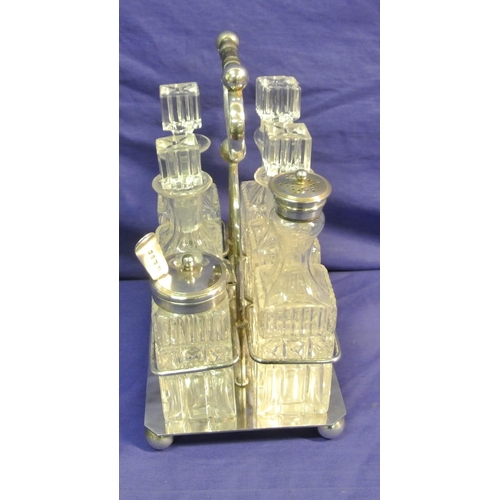 178 - Victorian style silverplated cruet set with six glass bottles and shaped handle