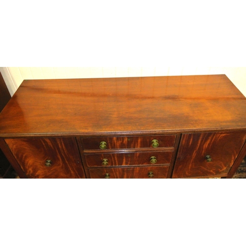 180 - Edwardian mahogany sideboard with reeded borders, three central drawers, two side presses, round bra... 