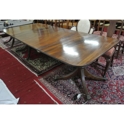 225 - Edwardian mahogany twin pedestal dining table with reeded borders, two extra leaves inset, raised on... 