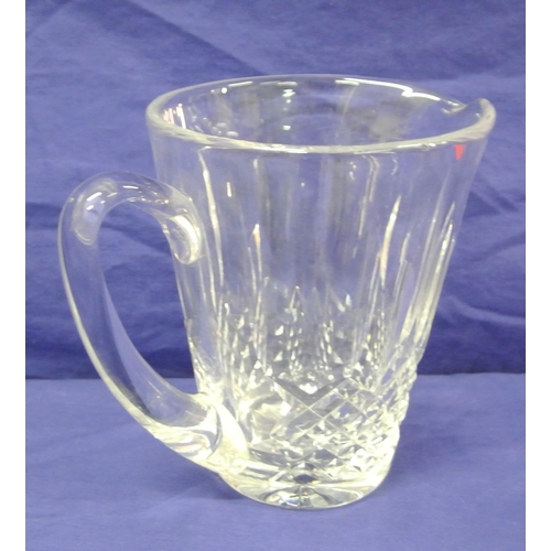 232 - Waterford Crystal ewer with shaped handle and diamond decoration