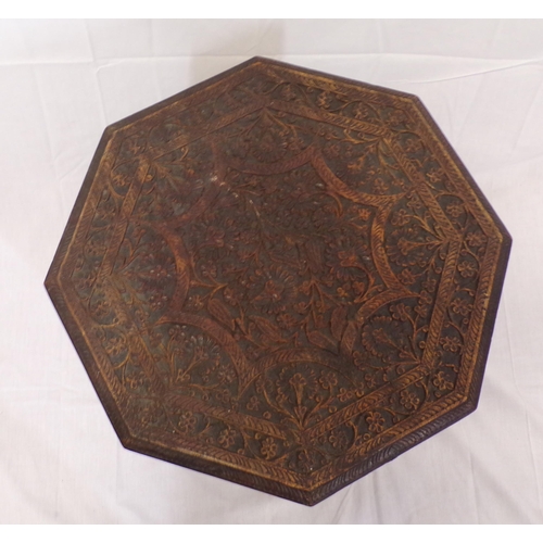 56 - Indian carved teak hexagonal shaped occasional table with folding base