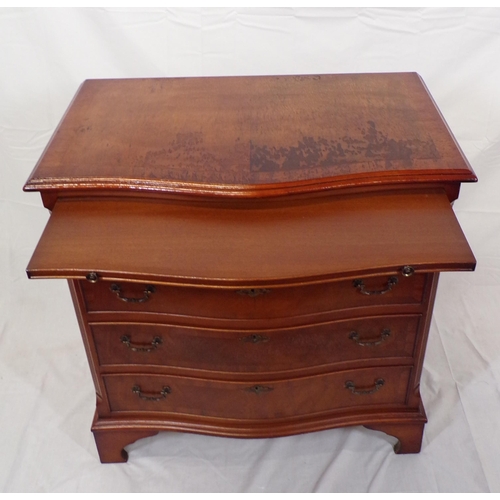 61 - Edwardian walnut and mahogany serpentine fronted bachelors chest with pull-out shelf, four drawers u... 