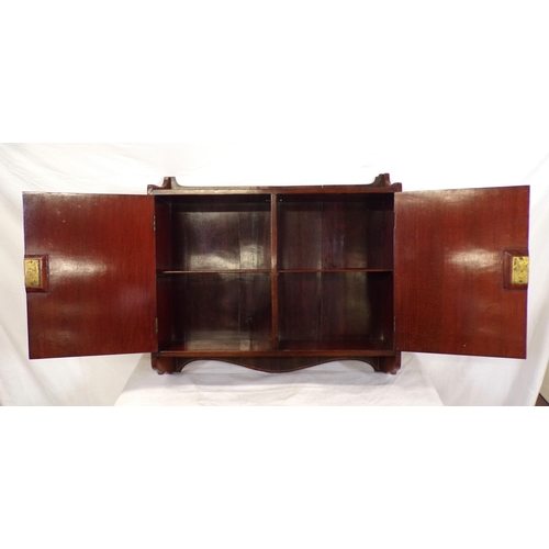 62 - Edwardian inlaid mahogany medicine cabinet or press with shelved interior, shell inlay, and shaped s... 