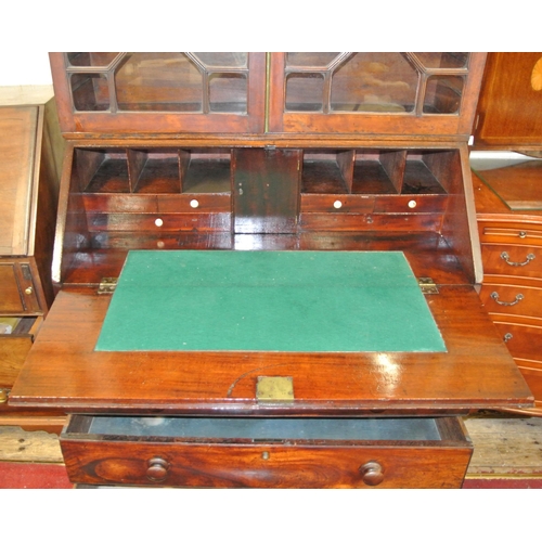 70 - Georgian mahogany bureau bookcase with dentil frieze, astragal glazed doors, reeded adjustable shelv... 