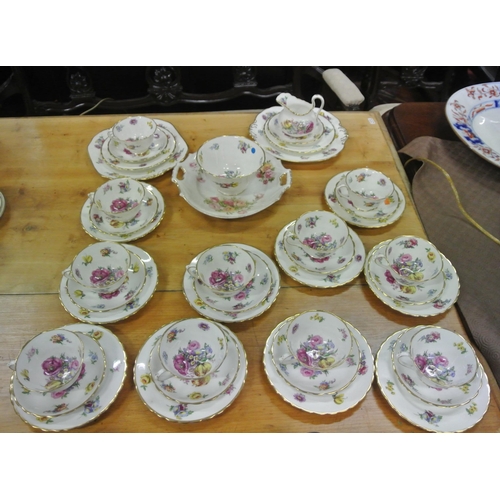 72 - Forty piece Victorian style tea service with foliate and gilt decoration